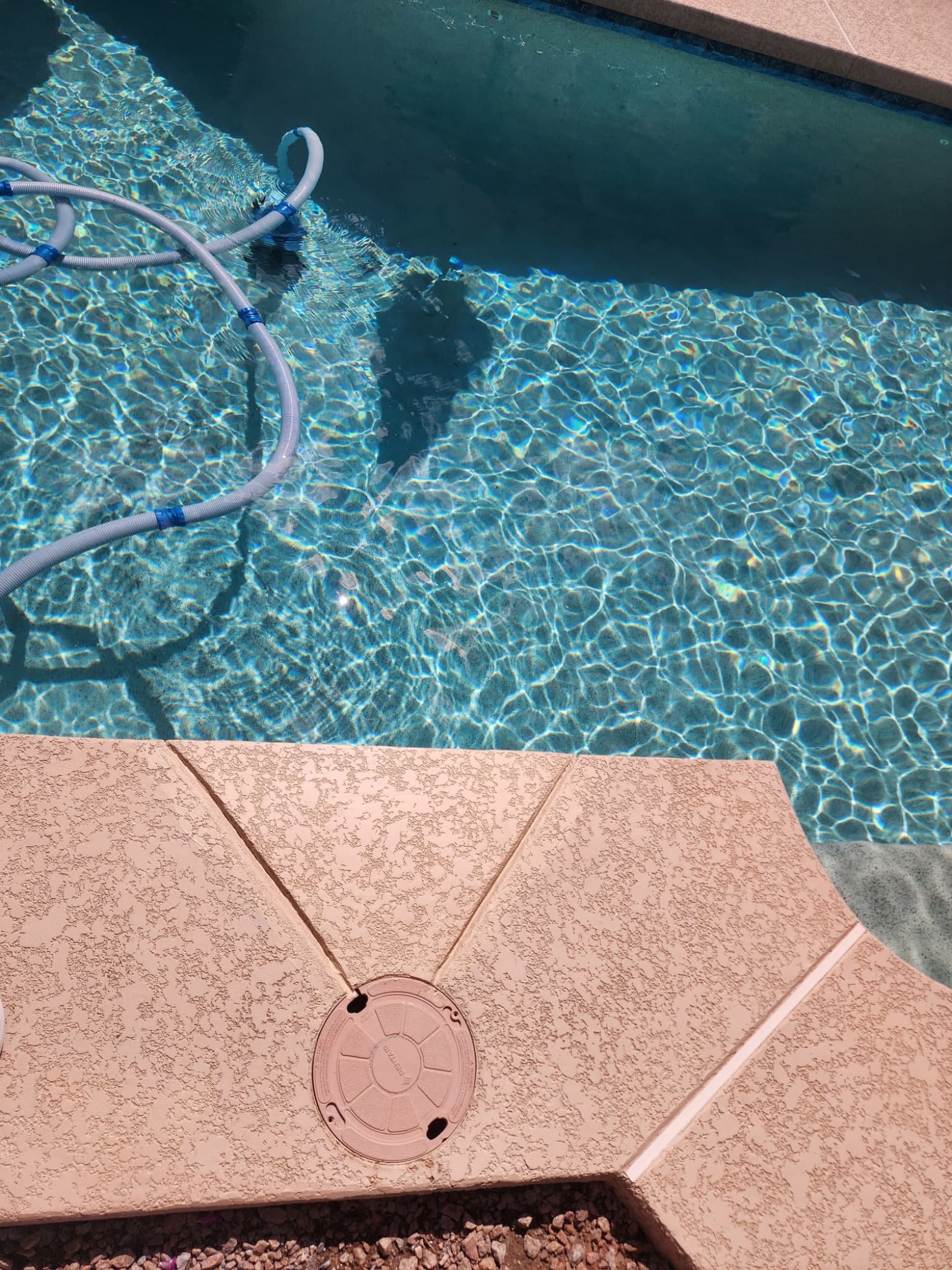 Restored pool deck concrete around the skimmer